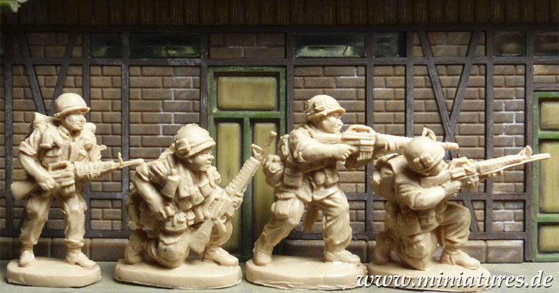 US Infantry in Vietnam with M16 assault rifles.